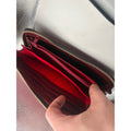 Dooney & Bourke Leather Wallet with Zipper Closure