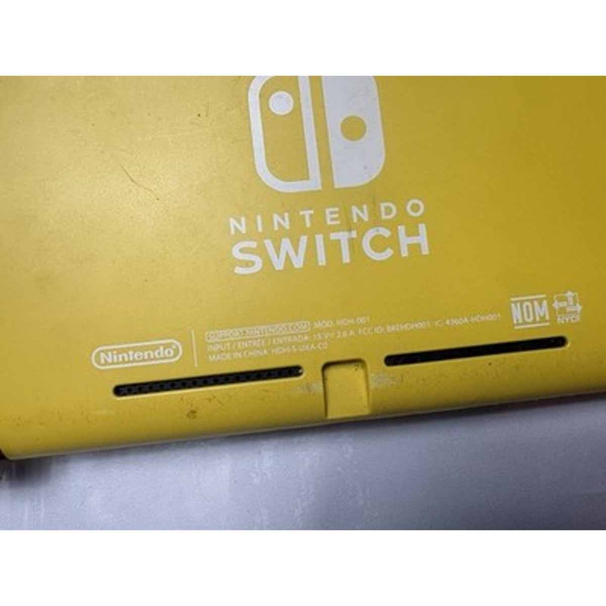Nintendo Switch Lite Yellow Handheld Console 32Come With Charger And 32 Gb Card